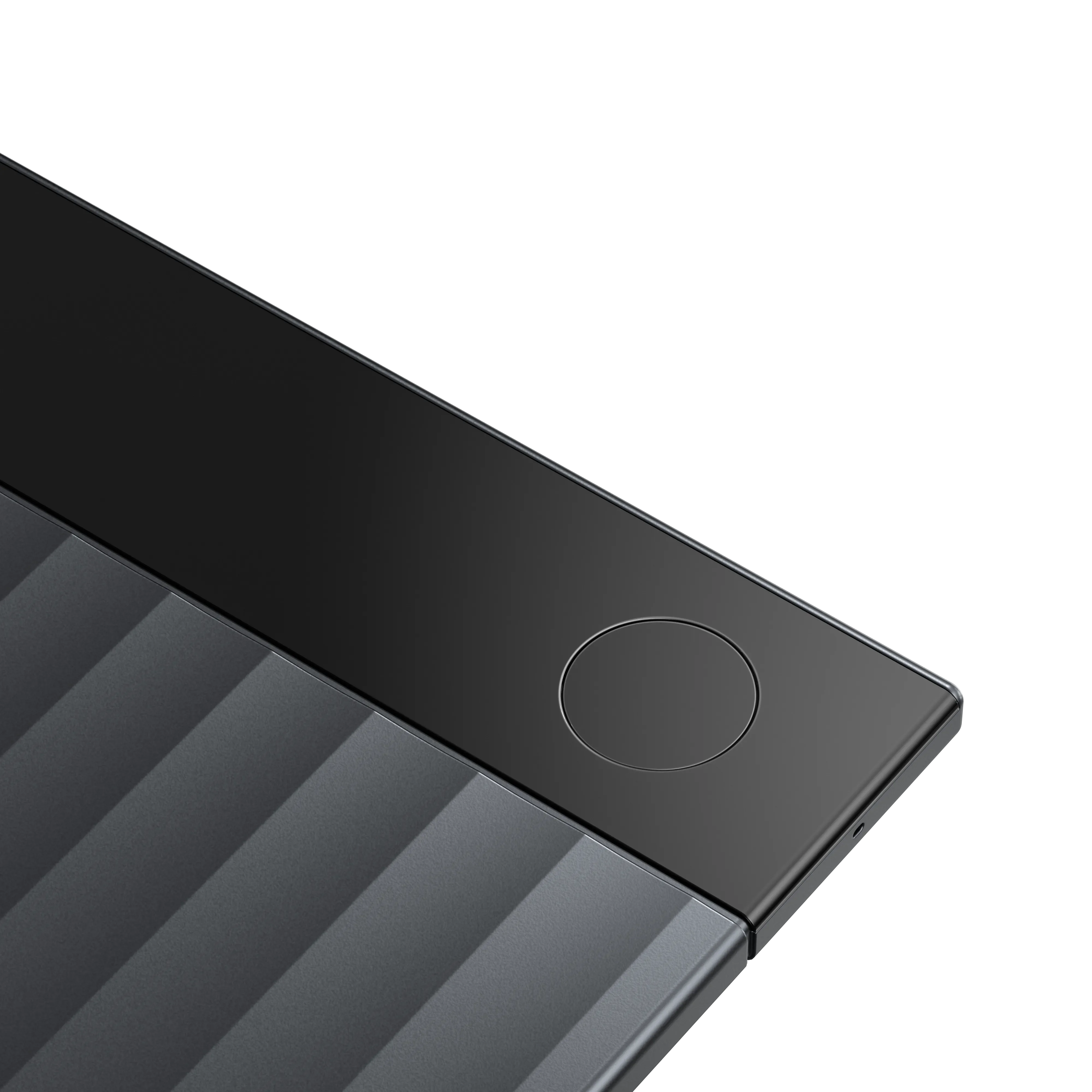 Close-up of Plaud Note Pro featuring distinctive gray ribbed body design with functional circular button, premium AI voice recorder for meetings and calls