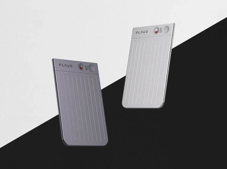 Silver and black Plaud Note Pro AI voice recorders with ribbed bodies and small screens on a split background.